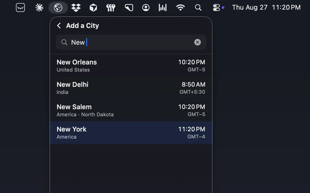 The Add a City search filtered to “New”, listing New Orleans, New Delhi, New Salem and New York with each city's current local time.